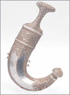 Picture of A Kutch Bhuj (Gujarat) silver 'kaftan* (dagger) finely carved with Mughal pattern floral motifs (lot 8)