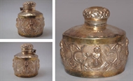 Picture of A very fine intricately carved Rajasthani Silver and gilded inkwell depicting Lakshmi