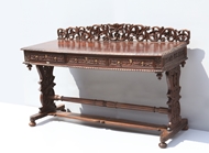 Picture of A VICTORIAN ROSEWOOD WRITING TABLE