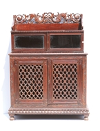 Picture of A ROSEWOOD SIDE CABINET WITH CARVED TOP FRIEZE