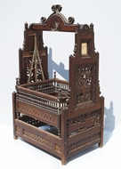 Picture of A VERY FINE ROSEWOOD HEAVILY CARVED CRADLE (PALKI)