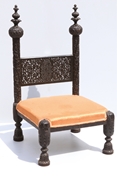 Picture of A CARVED ROSEWOOD LOW NURSING CHAIR