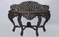 Picture of A VERY FINE CARVED INDIAN TEAKWOOD SERPENTINE CONSOLE TABLE,