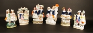 Picture of A GROUP OF SIX VICTORIAN STAFFORDSHIRE FIGURES DEPICTING COUPLES