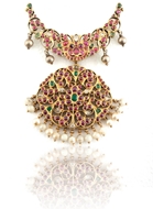 Picture of AN ATTRACTIVE RUBY, EMERALD AND SAPPHIRE OPEN WORK MEDALLION PENDANT SET IN GOLD